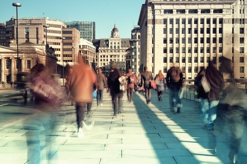 People walking in a busy city sidealk