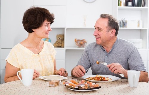 20 - Two people talking over lunch.jpg