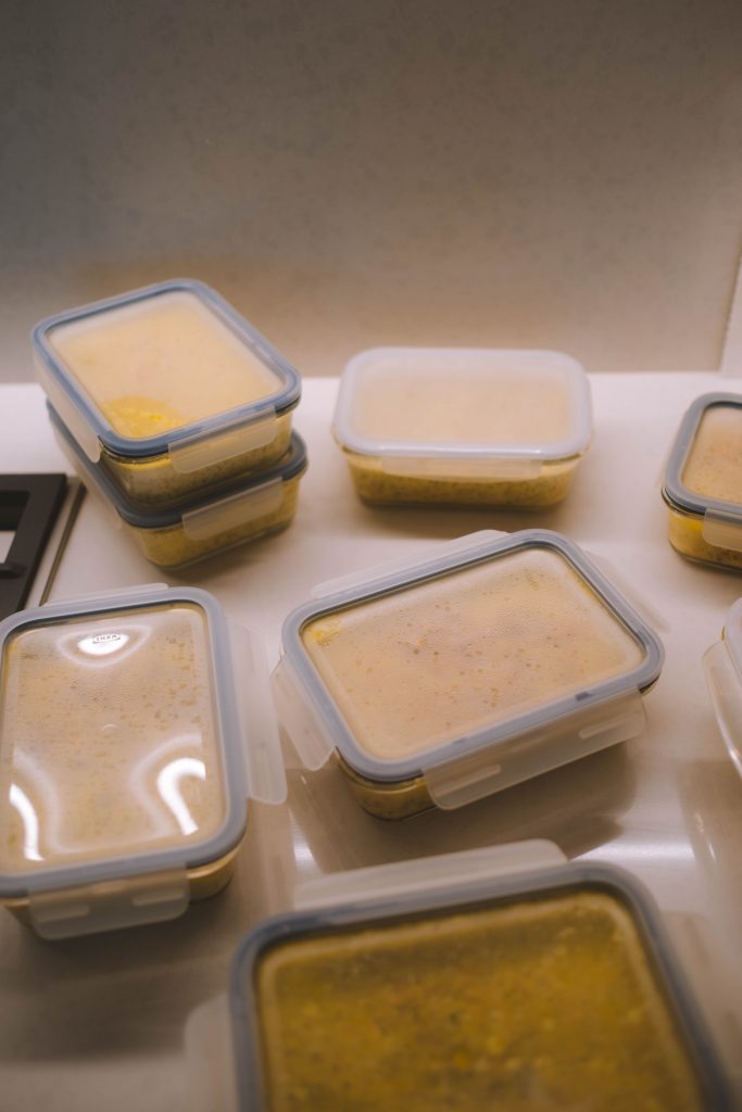 Many reusable food storage containers filled with meals