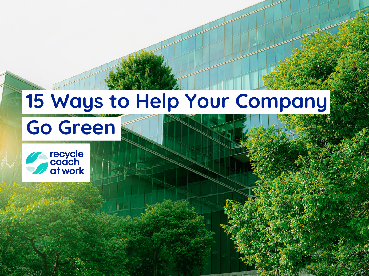 Office building with glass windows and trees in front