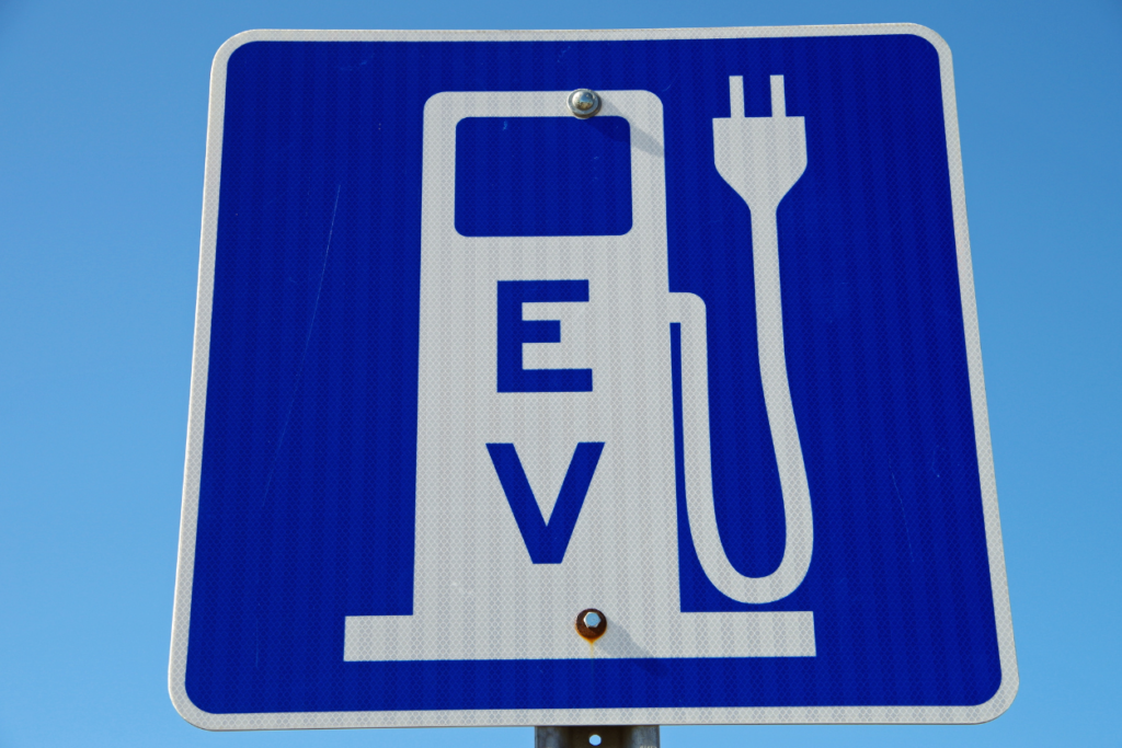 Road sign for charging electric vehicles