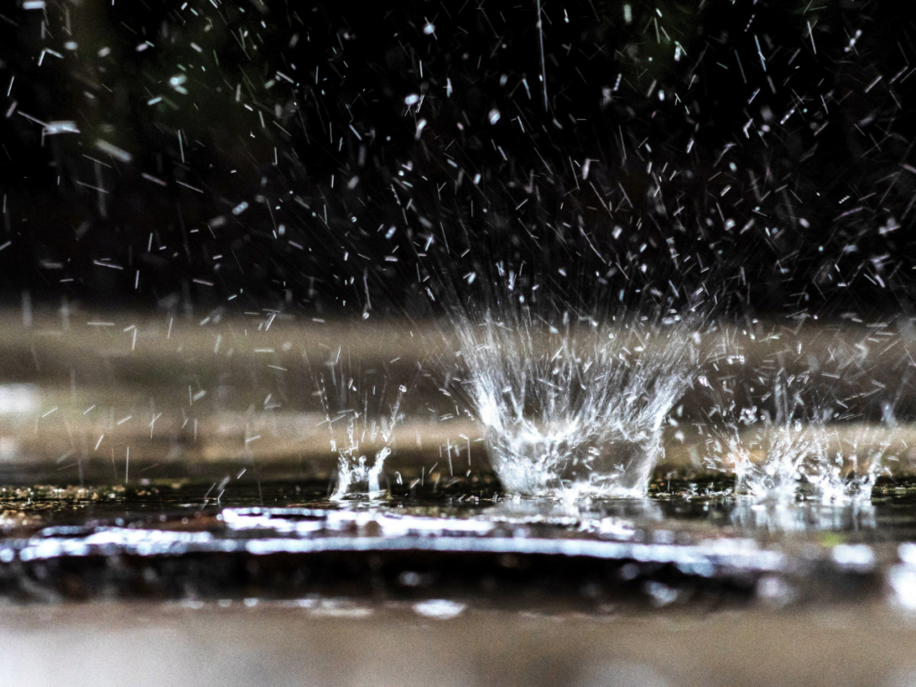 raindrops splashing in a puddle