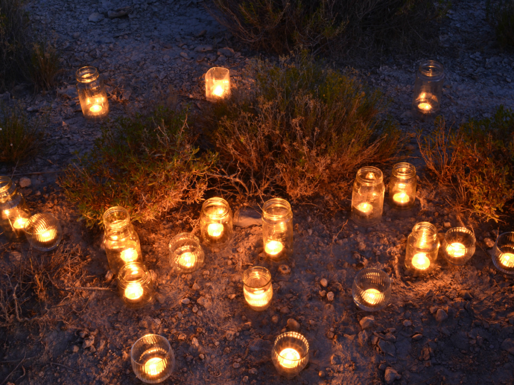 jars being reused as candle votives outside